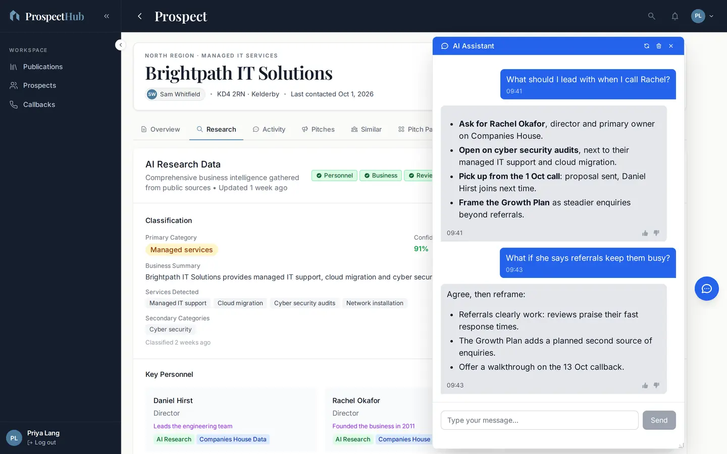 The ProspectHub assistant open over a prospect's research, answering a rep's questions about what to lead with on a call and how to handle an objection, using the prospect's research and notes.